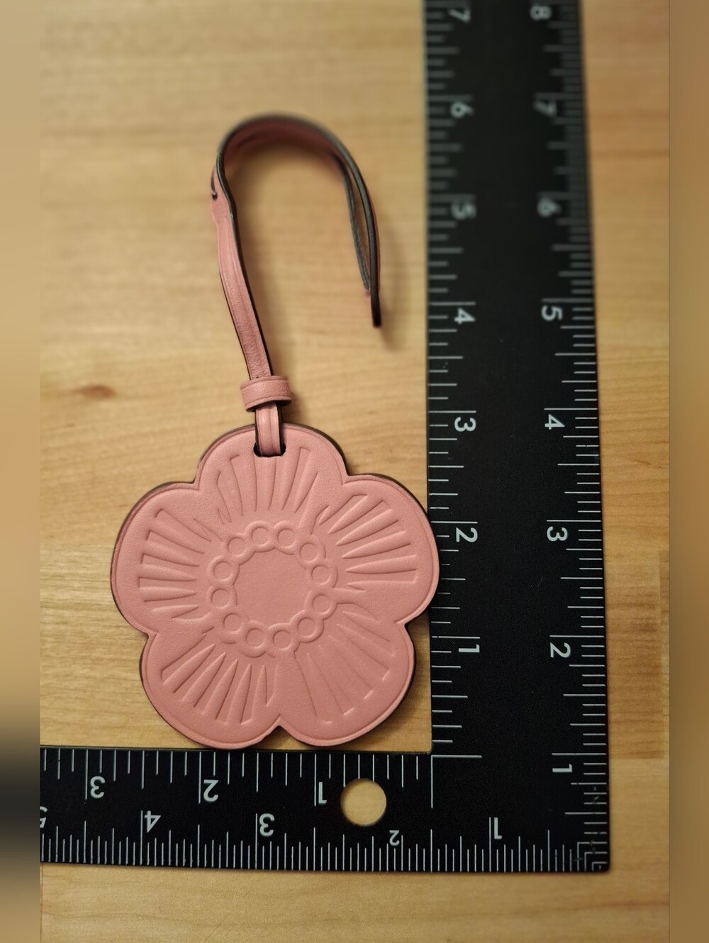 pink Coach flower charm